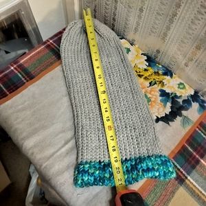 Long knitted hat.